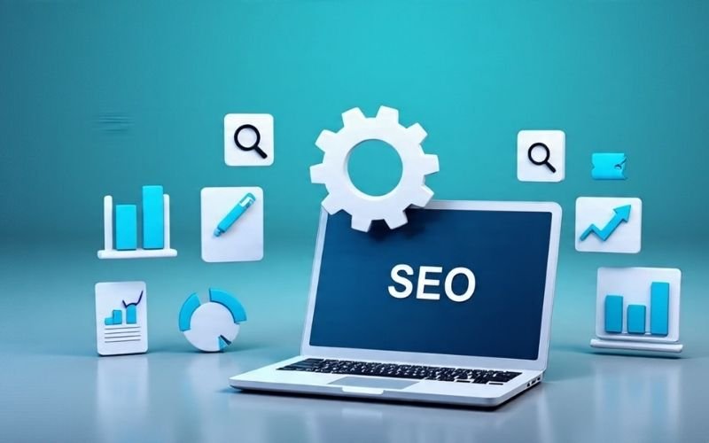 Laptop screen displaying the word SEO with digital marketing icons, representing search engine optimization strategies for business growth.