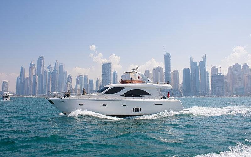 Luxury yacht cruising near Dubai Marina for boat rental services